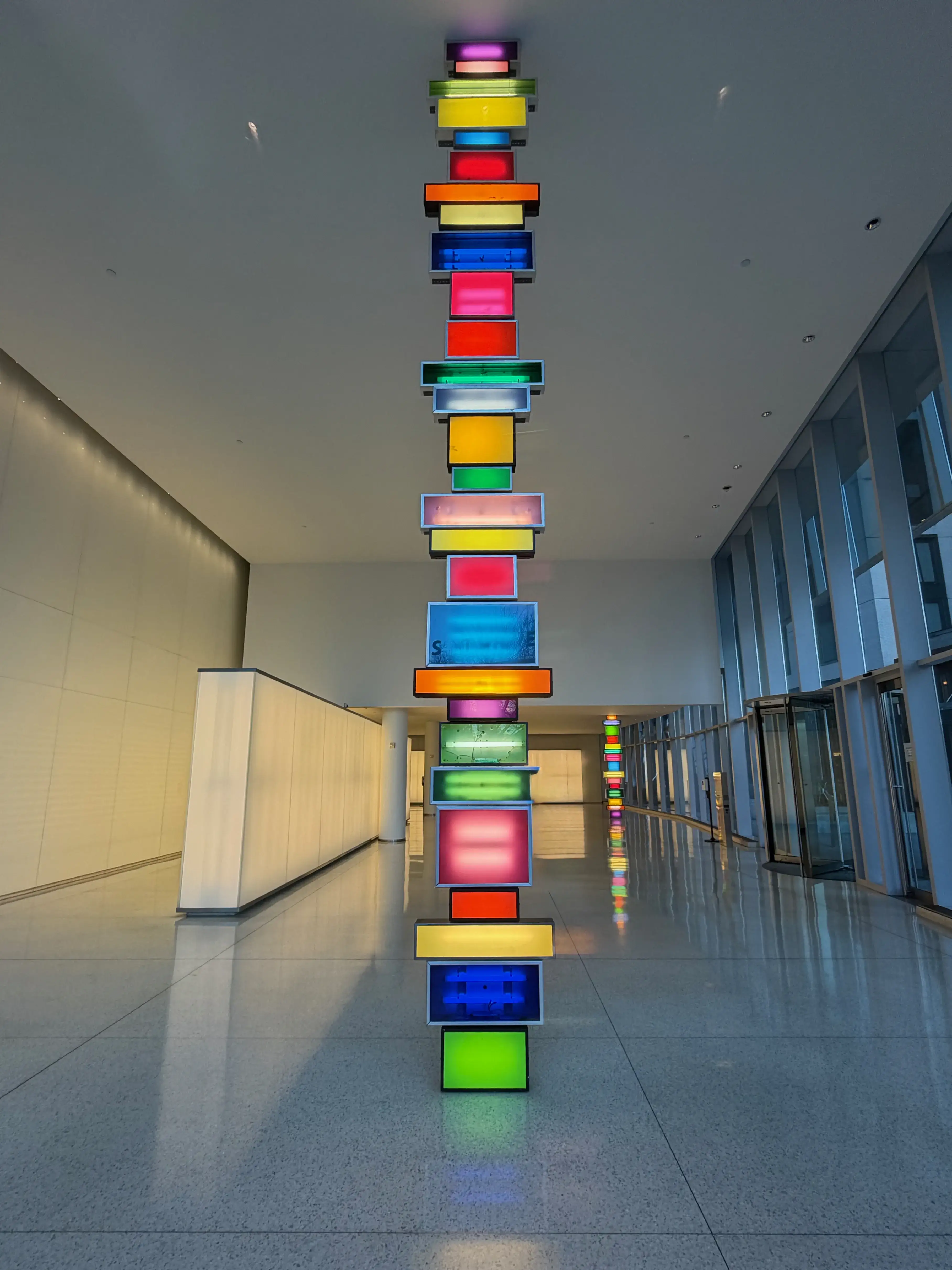 Art installation of brightly lit cubes, stacked atop each other. NOMA, Washington, DC.