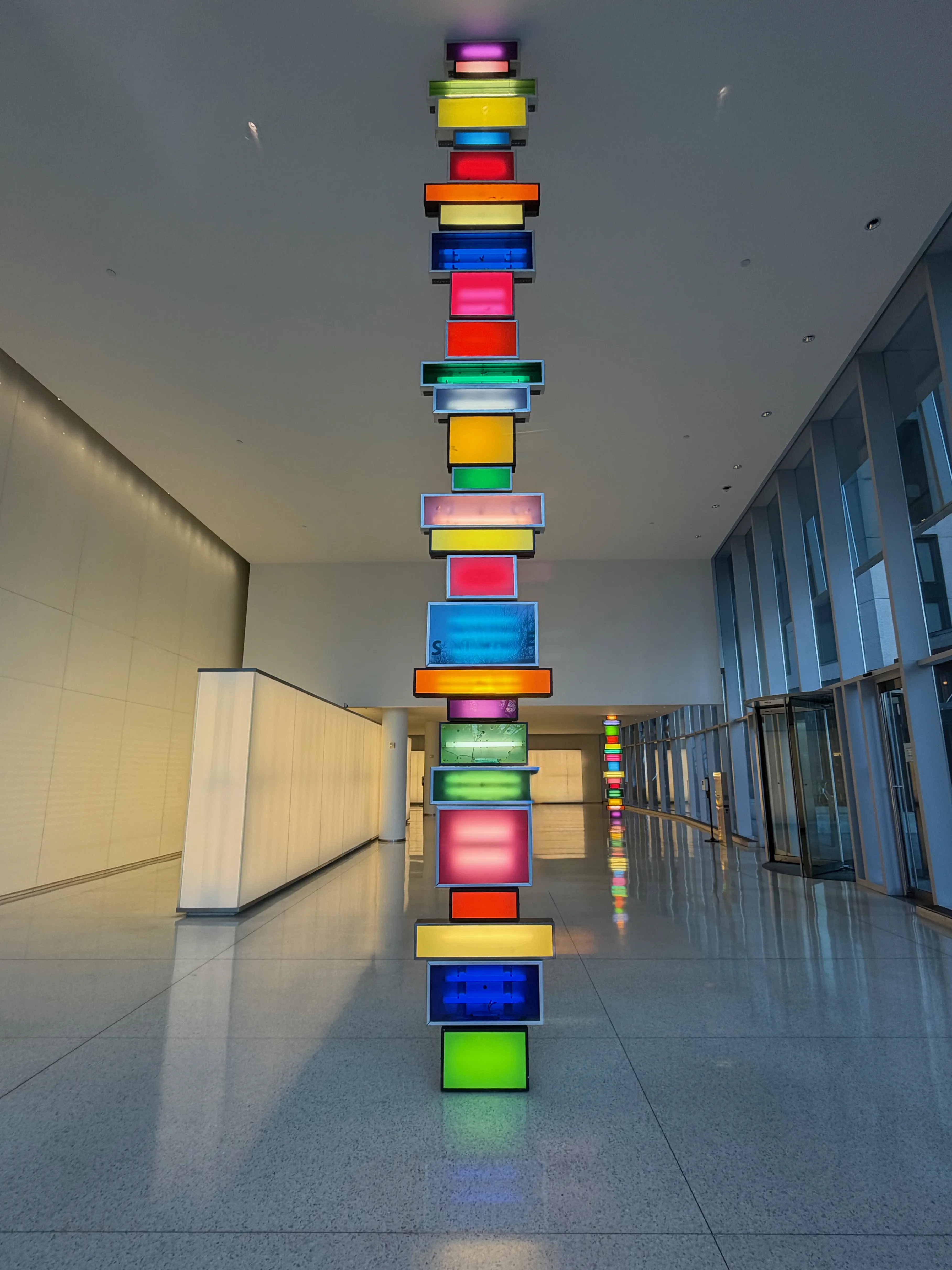 Art installation of brightly lit cubes, stacked atop each other. NOMA, Washington, DC.